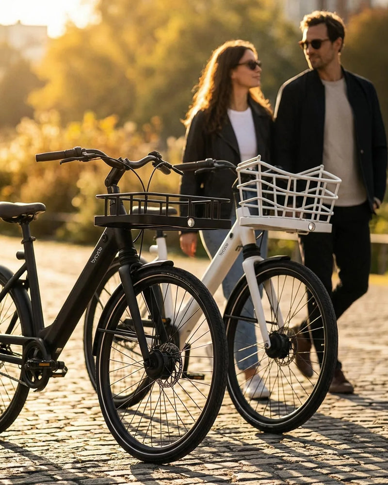 Bycycle lifestyle — sunset walk couple