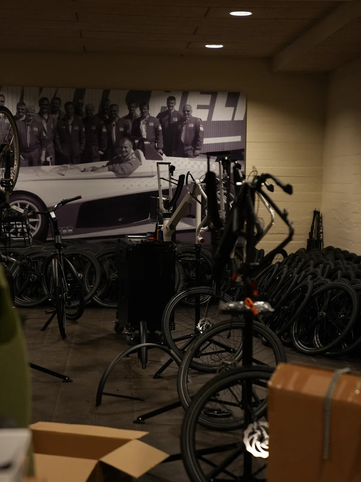 A wide view of the workshop with bikes and frames